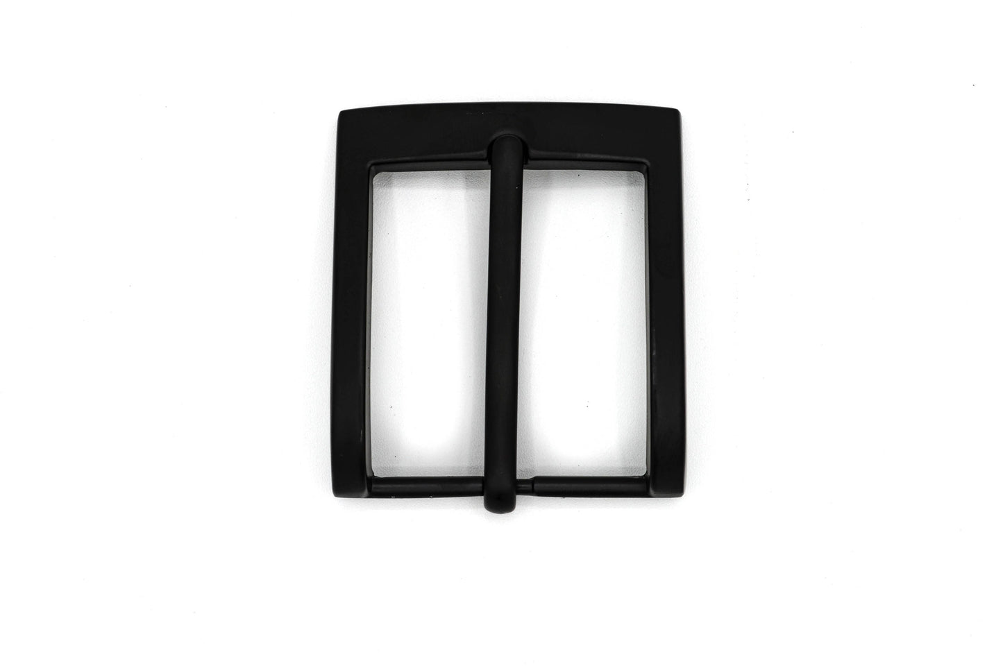 Black belt buckle on a white background