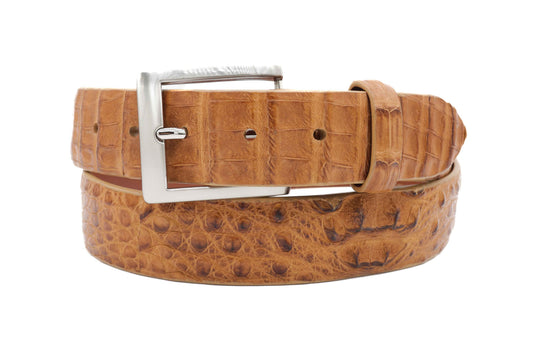 Tan crocodile leather belt with a square silver buckle on a white background