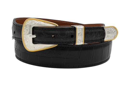 Black alligator skin belt with silver and gold buckle on a white background