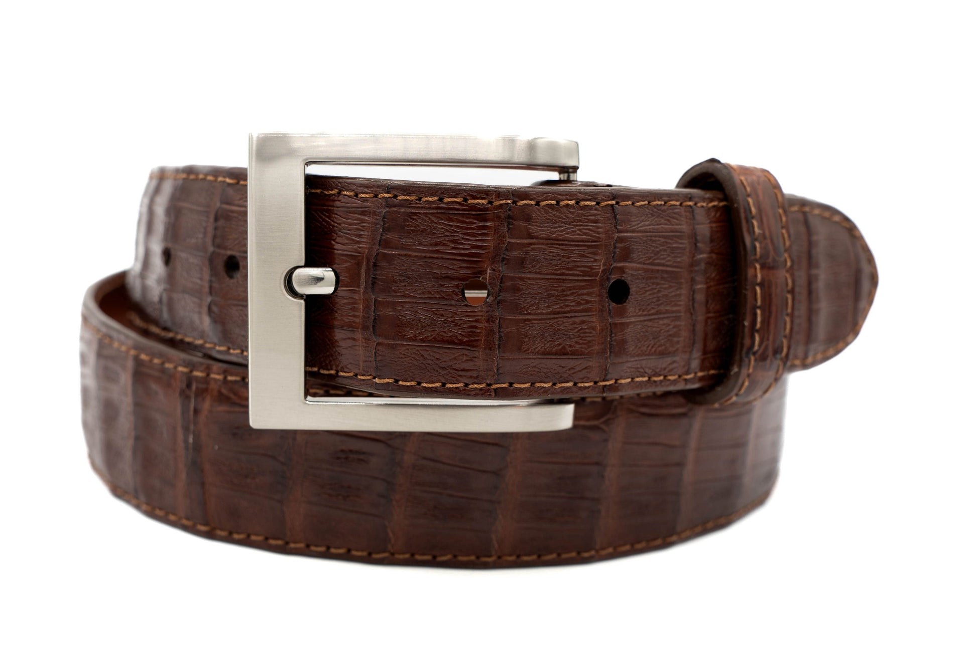 Brown crocodile leather belt with a silver buckle on a white background