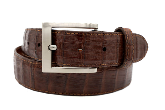 Brown crocodile leather belt with a silver buckle on a white background