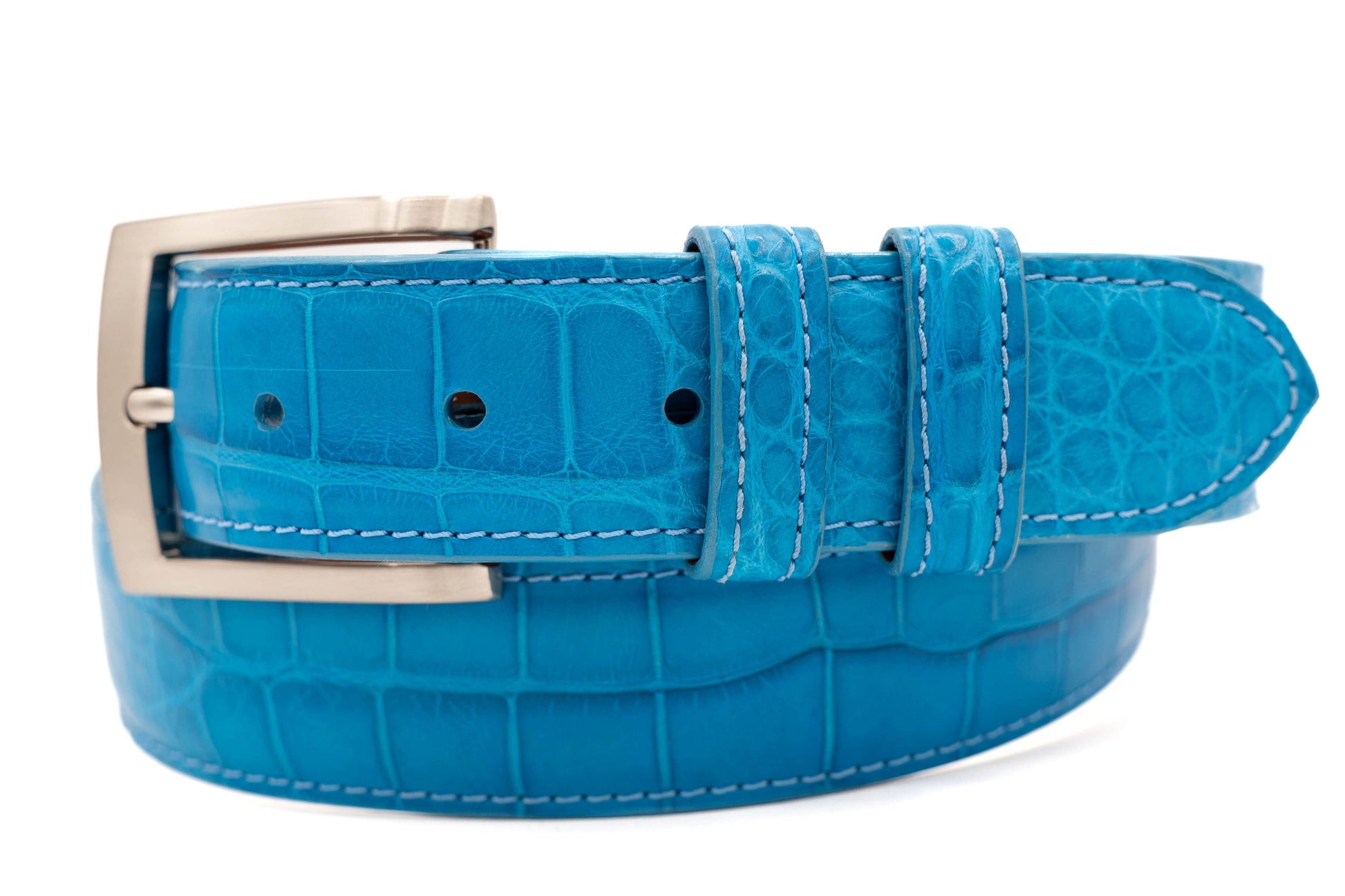 Blue alligator belt with a square silver buckle on a white background